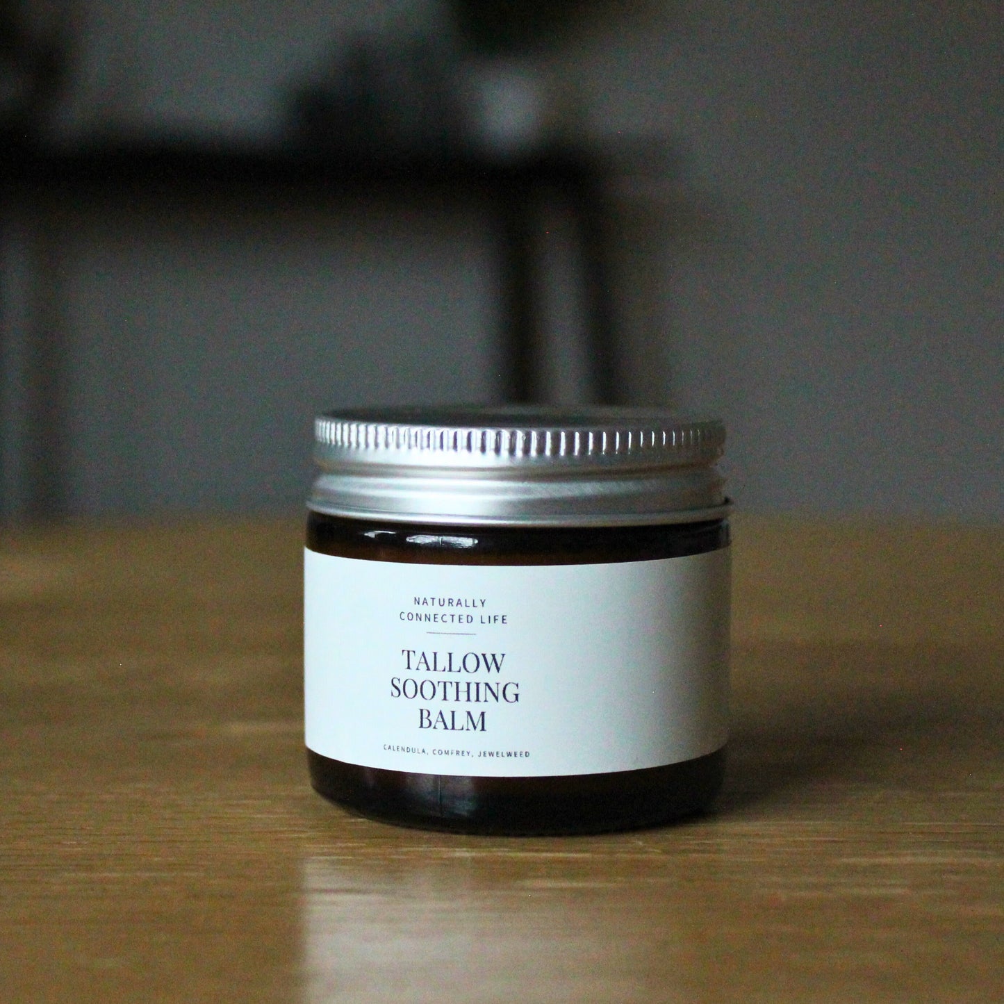 Glass jar of tallow soothing balm, healing tallow cream, grass-fed beef tallow skincare product for healing wounds, soothing itch, scratch, minor cuts.