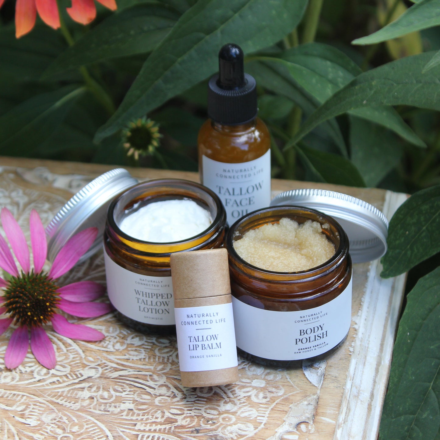 naturally connected life back to school sale, tallow face oil for glowing skin, whipped tallow lotion, tallow lip balm, body polish, products for teenage girls, natural skincare for teens, selfcare ritual for teen girls, back to school gifts for teens