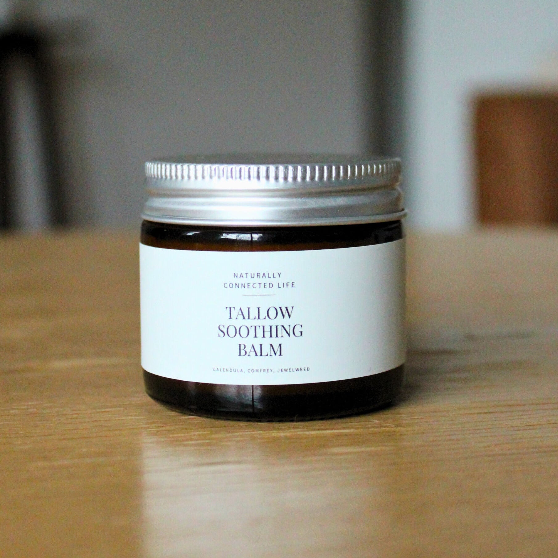 Handmade small batch jar of tallow soothing balm, grass-fed beef tallow balm to soothe scratches, cuts, and rashes. Handmade tallow skincare in Asheville, NC. 