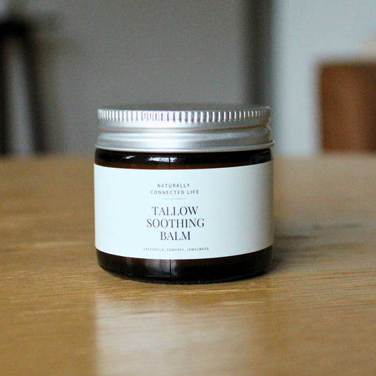 Handmade small batch jar of tallow soothing balm, grass-fed beef tallow balm to soothe scratches, cuts, and rashes. Handmade tallow skincare in Asheville, NC. 